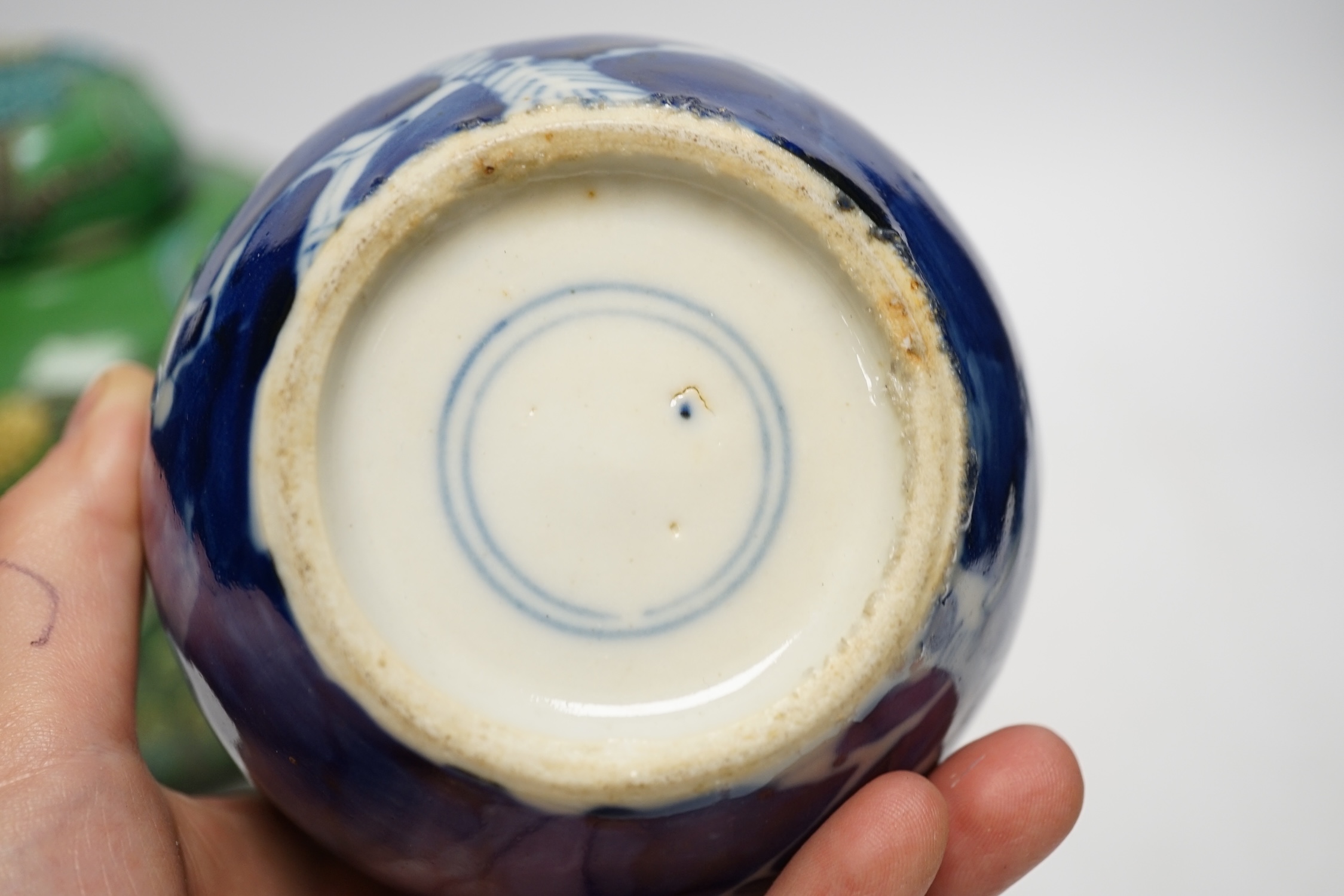 Two Chinese lidded ginger jars, one with applied decoration and the other with blue and white prunus decoration, tallest 18cm. Condition - fair, one lid restored